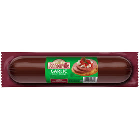Johnsonville garlic summer sausage sliced on a charcuterie board, perfect for cheese pairings and entertaining.