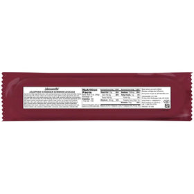 Sliced Johnsonville Summer Sausage on a cheese board with accompaniments