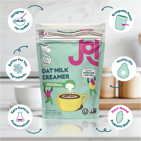 JOI oat milk creamer being poured into coffee for a creamy dairy-free result.