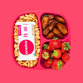 Jonesbar organic peanuts, almonds, strawberries close-up.