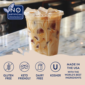 Jordan's Skinny Mixes sugar free syrup bottle with latte art in a glass.