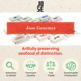 Lemon slices accompany Jose Gourmet sardines for a citrus-balanced pairing.