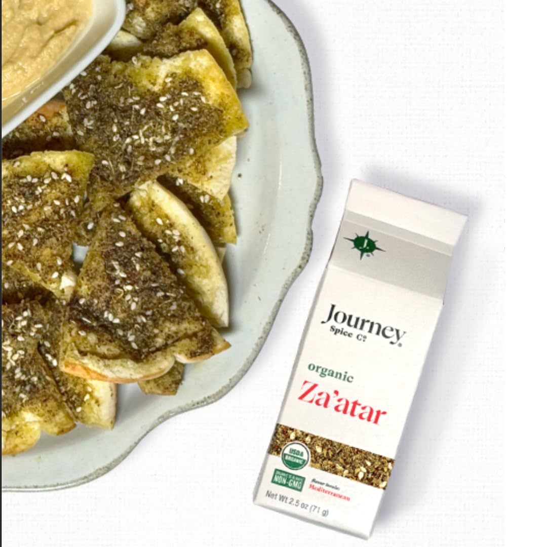 Journey Spice Co. Za'atar pouring from a spoon for quick flavoring