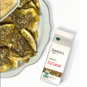 Journey Spice Co. Za'atar pouring from a spoon for quick flavoring