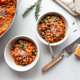 Jovial brown rice orzo plated with sauce for a versatile meal idea.