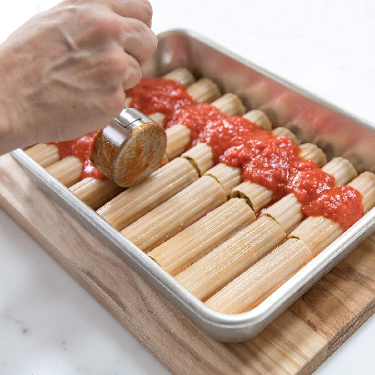 Jovial made-in-Italy artisans crafting authentic pasta experience.