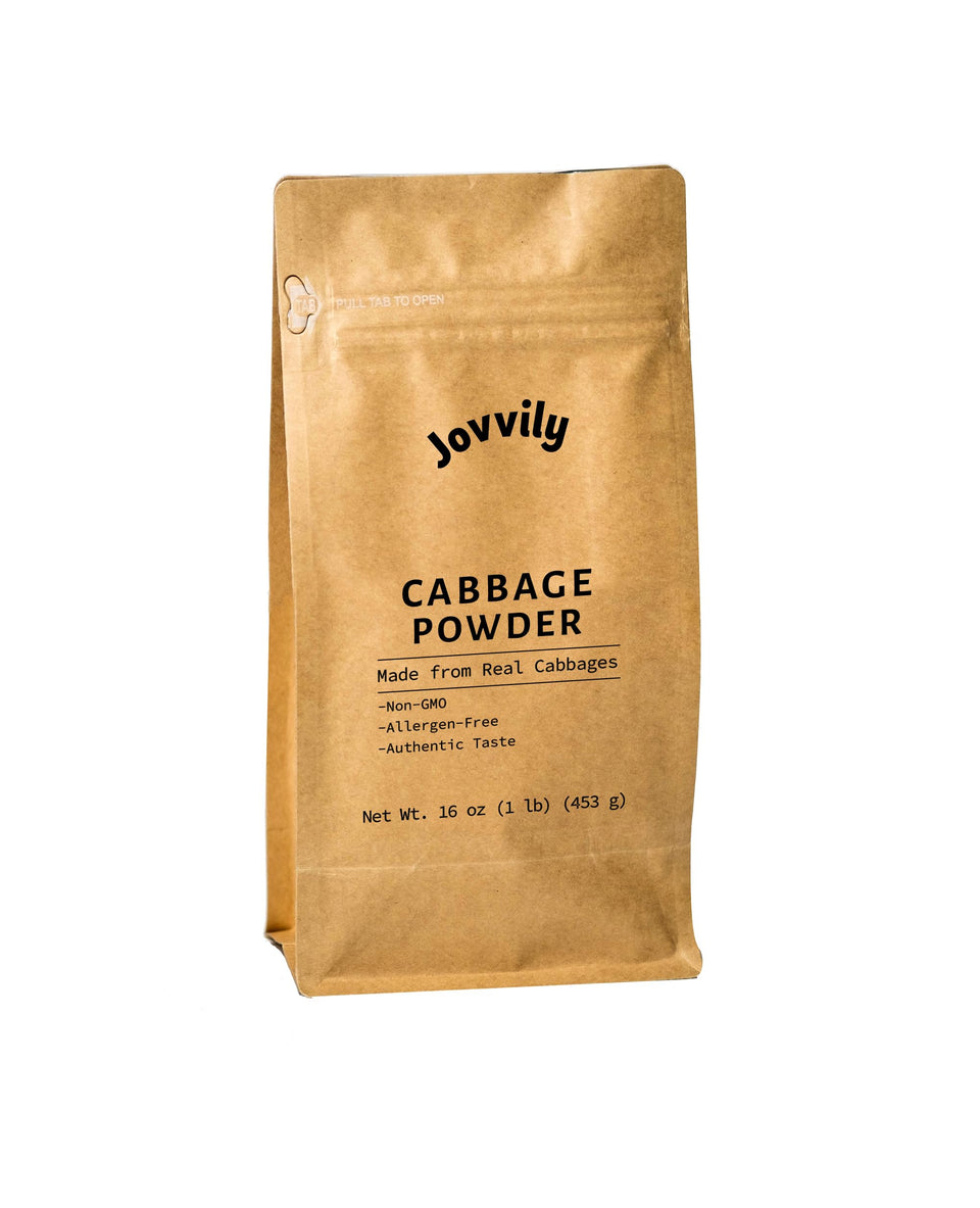 Jovvily Cabbage Powder is poured into a cup for soups and drinks.