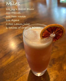 Joy's Island Spice Sorrel Elixir gift packaging conveys an elegant hostess presentation.