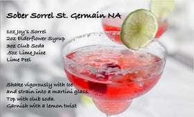Joy's Island Spice Sorrel Elixir spritz-ready with tonic water for quick tropical refreshment.