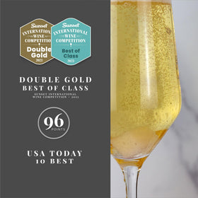 Joyus sparkling wine being poured into a flute, ready for a mindful celebration.