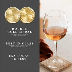 Joyus rose wine pouring into a glass, crisp aroma and balanced finish.
