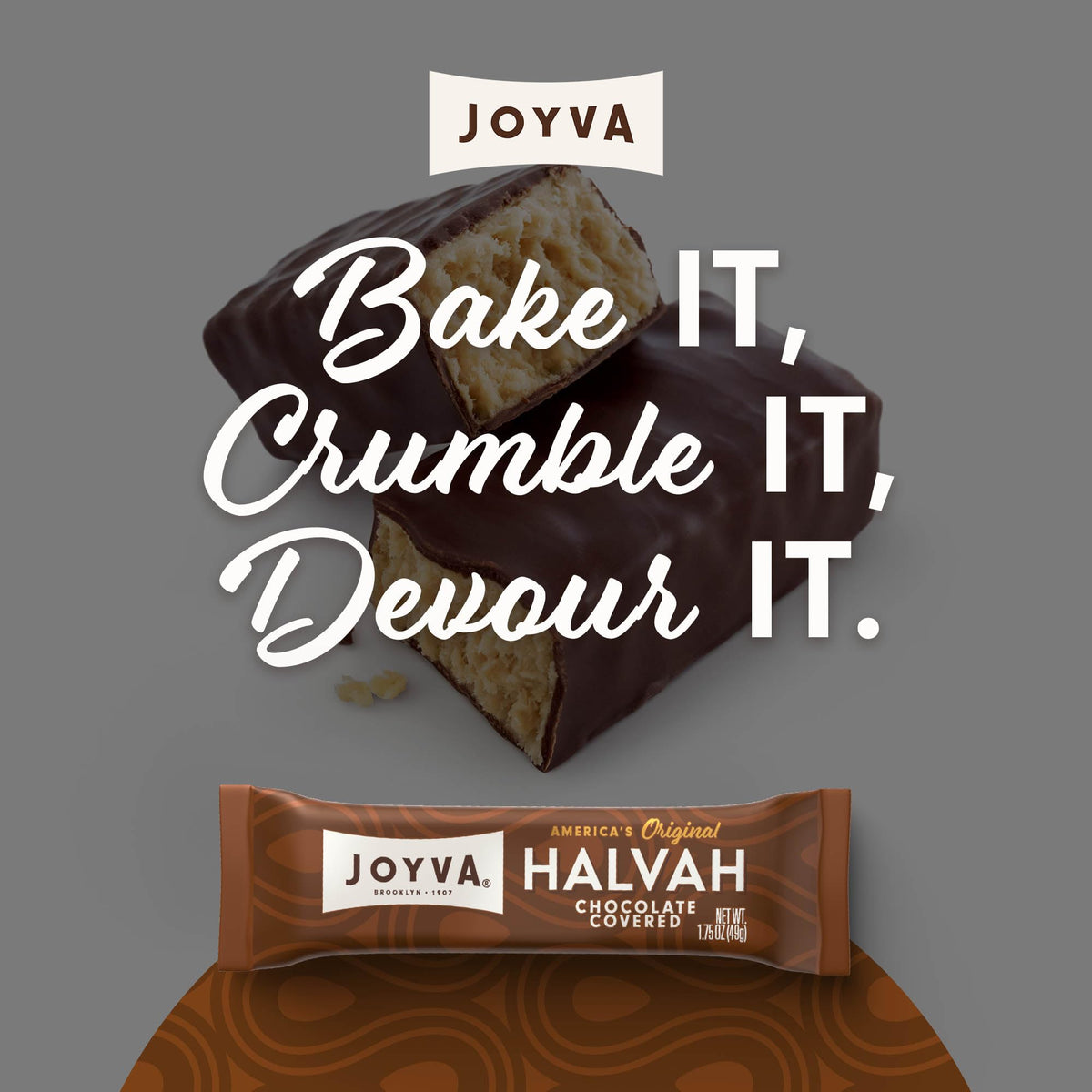 Joyva Halvah chocolate-coated piece close-up reveals creamy sesame center.