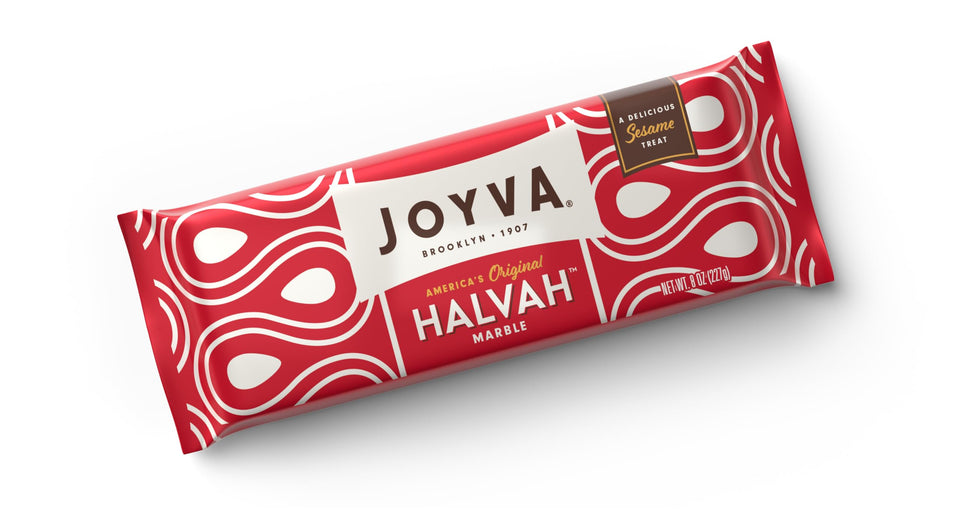 Joyva Halvah Marble bite closeup; tasty sesame snack option.