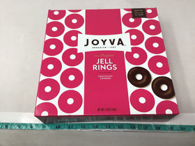 Joyva Raspberry Jell Rings close-up highlighting glossy raspberry glaze and chewy texture.