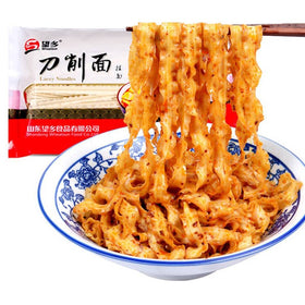 Serving dish of JTEDZI noodles ready to enjoy with sauce