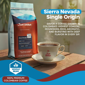Juan Valdez Sierra Nevada whole beans close up, rich aroma potential.