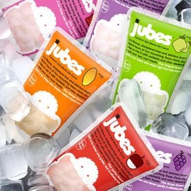 Jubes Nata De Coco grocery jar display showcases versatile jelly cubes.