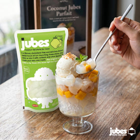 Jubes Pandan Nata De Coco Jelly Cubes on a dessert plate for colorful toppings.