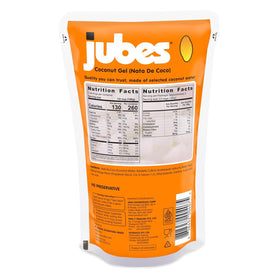 Jubes jelly cubes topping a bubble tea drink, showcasing chewy texture and tropical flavors.