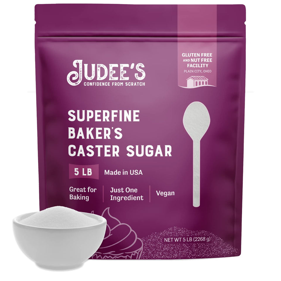 Judee's Gluten Free superfine caster sugar pour bottle highlighting smooth texture for delicate desserts