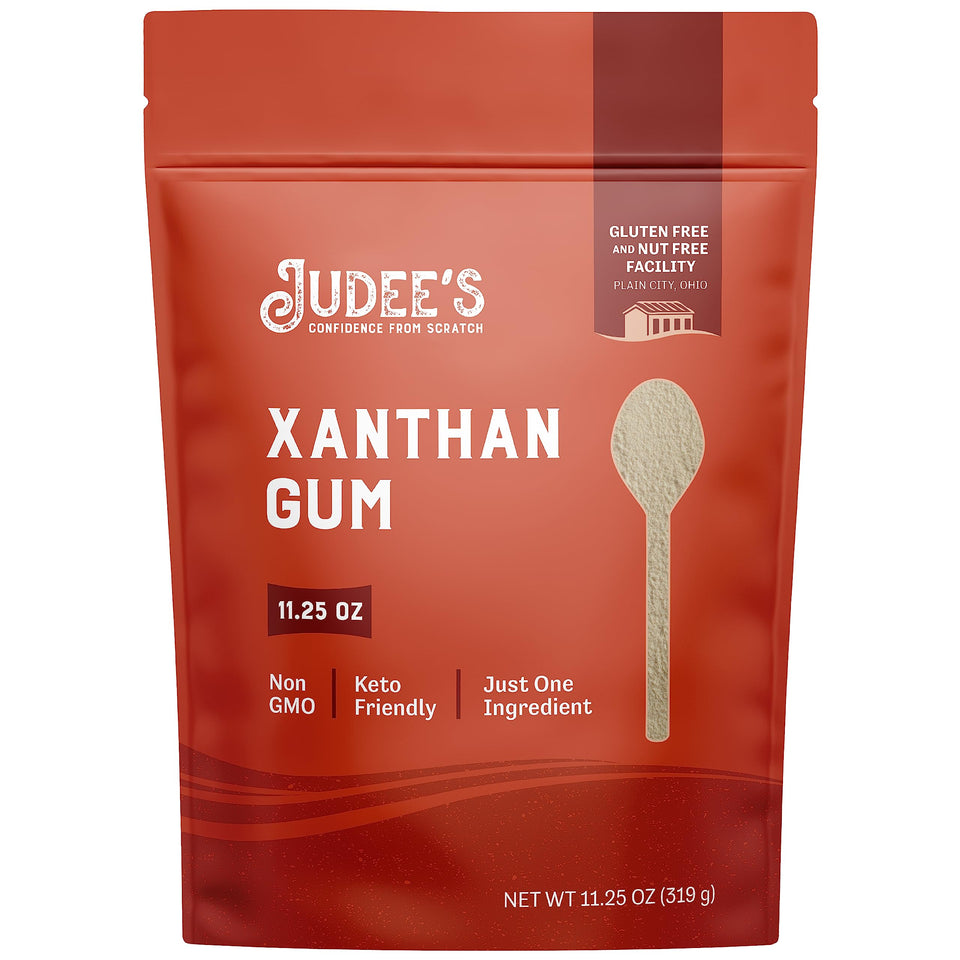 Judee's Gluten Free Xanthan Gum powder bottle front view enhancing gluten-free baking texture.