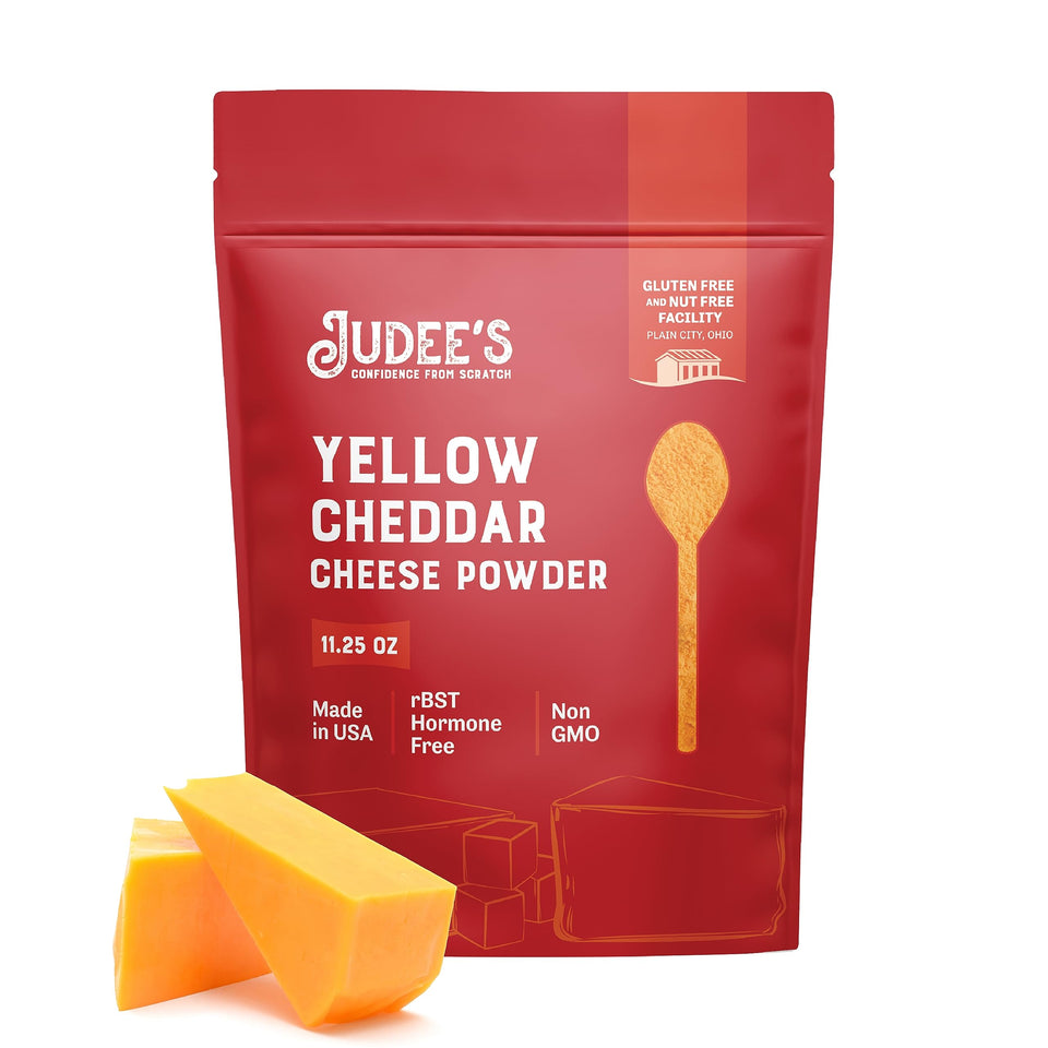 Judee's Gluten Free cheddar powder bottle adds rich flavor to sauces.
