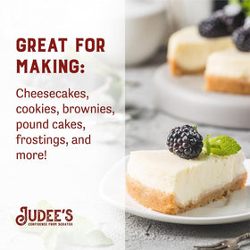 Judee's Powdered Cream Cheese frosting in a bowl with smooth texture.