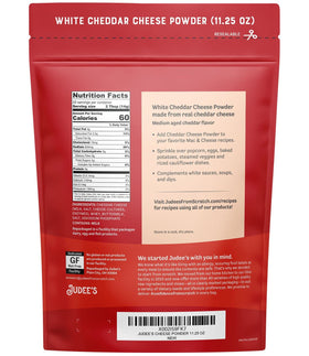 Judee's White Cheddar Cheese Powder container ready for creamy dips and spreads.