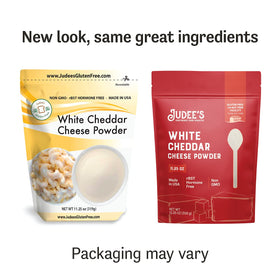 Judee's White Cheddar Cheese Powder sprinkled on popcorn for savory bites.