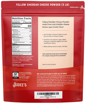 Close-up of Judee's cheddar powder texture showing rich granules for sauces.