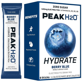 PeakH2O Berry Blue dissolving in water for a crisp, zero-calorie sip.
