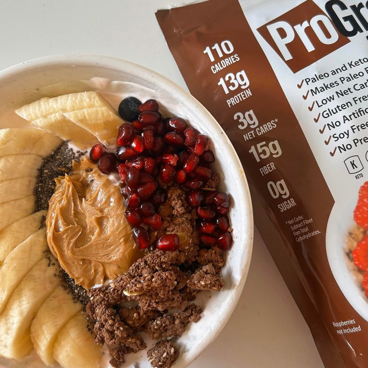 ProGranola Chocolate bite close-up, rich flavor and crunch.