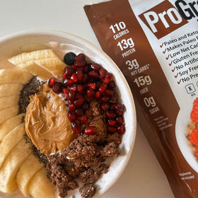 ProGranola Chocolate bite close-up, rich flavor and crunch.