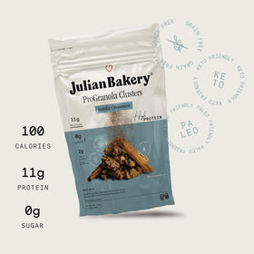 Close-up of ProGranola Vanilla Cinnamon Cluster with milk pour for crunch and flavor