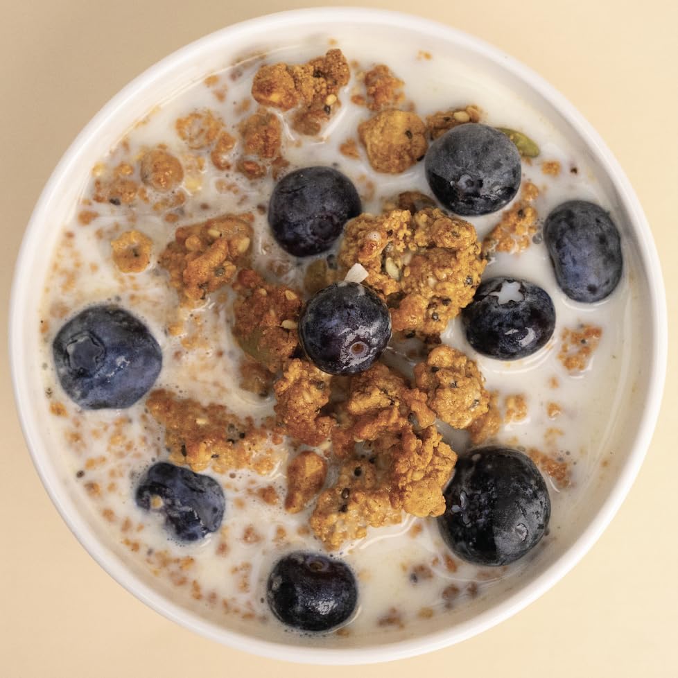Bowl of cereal with vanilla cinnamon ProGranola texture and sparkle