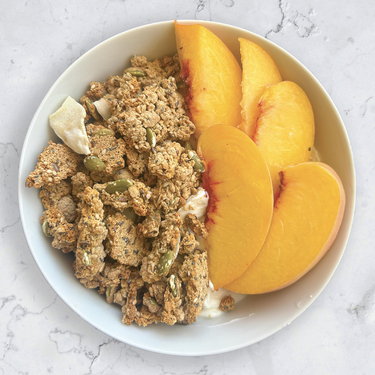 Julian Bakery ProGranola Vanilla Cluster bowl with yogurt, gluten-free snack for busy days.
