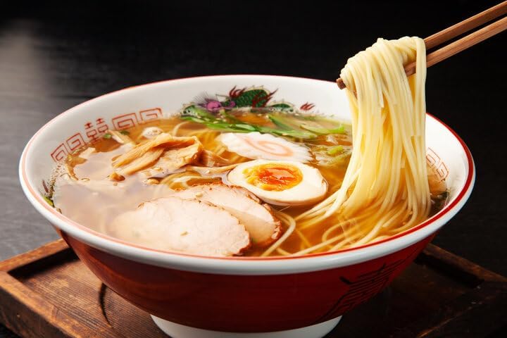June Moon Ramen Seasoning bottle pour highlights convenient flavor boost for broths.