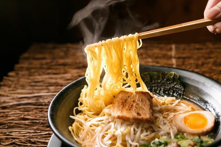 June Moon Ramen Seasoning broth-focused scene enhances depth.