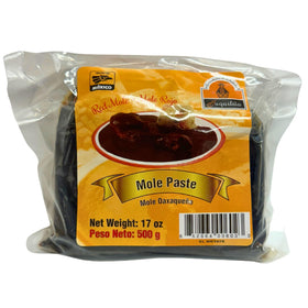 Juquilita Red Mole bottle pour shows a versatile sauce for weeknight meals