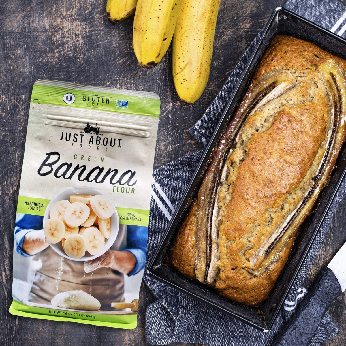 Just About Organic Banana Flour smoothie-thickener pouring into a glass for nutrition boost.