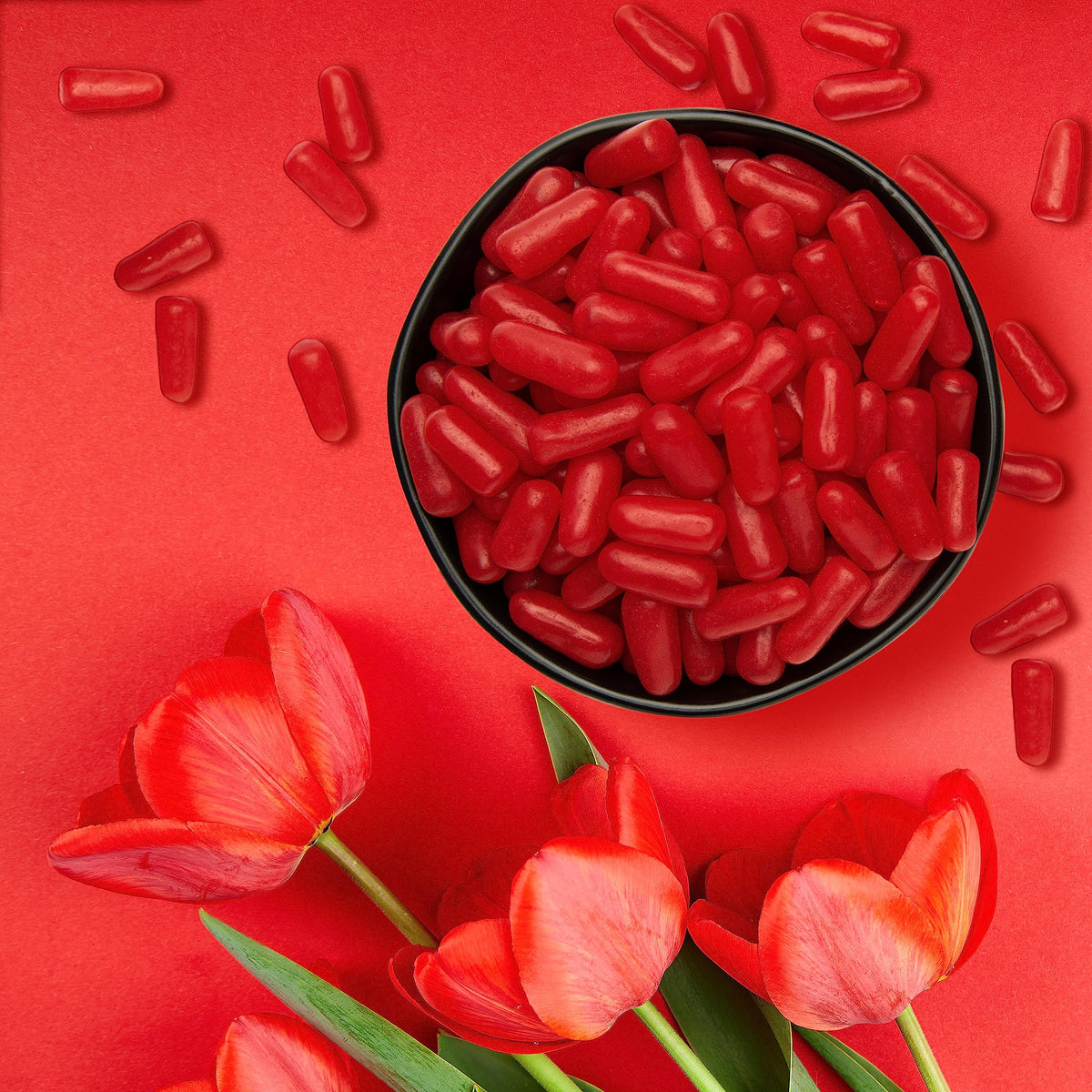 Just Born Hot Tamales Fierce Cinnamon candy close-up highlighting chewy texture and heat.