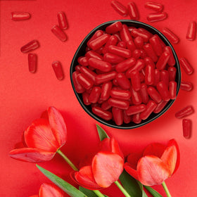 Just Born Hot Tamales Fierce Cinnamon candy close-up highlighting chewy texture and heat.