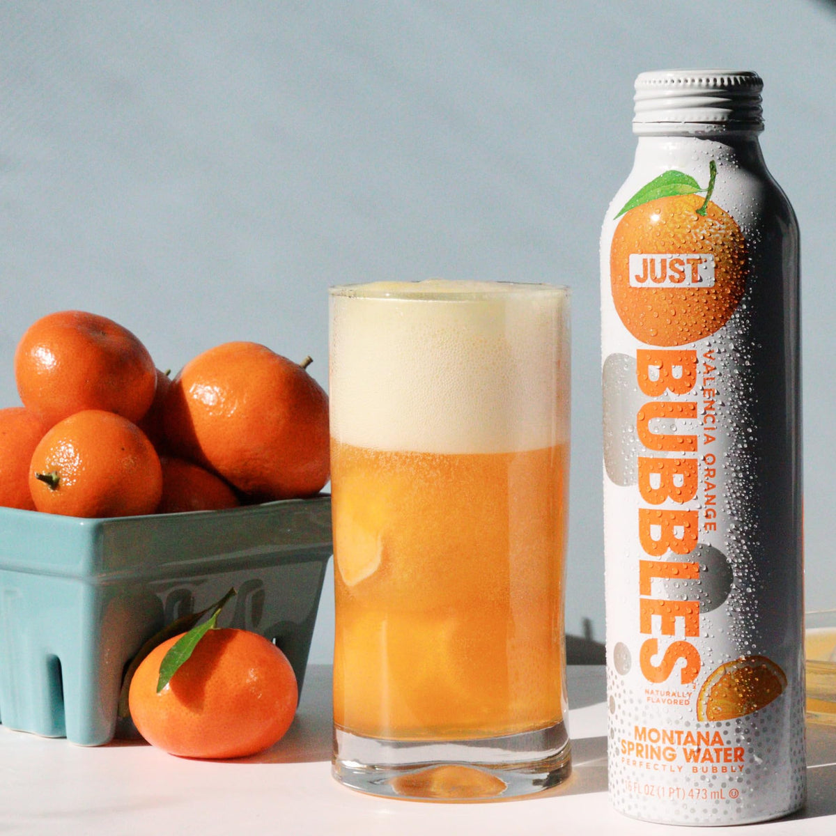 JUST Bubbles Valencia Orange bottle closeup shows natural mineral clarity
