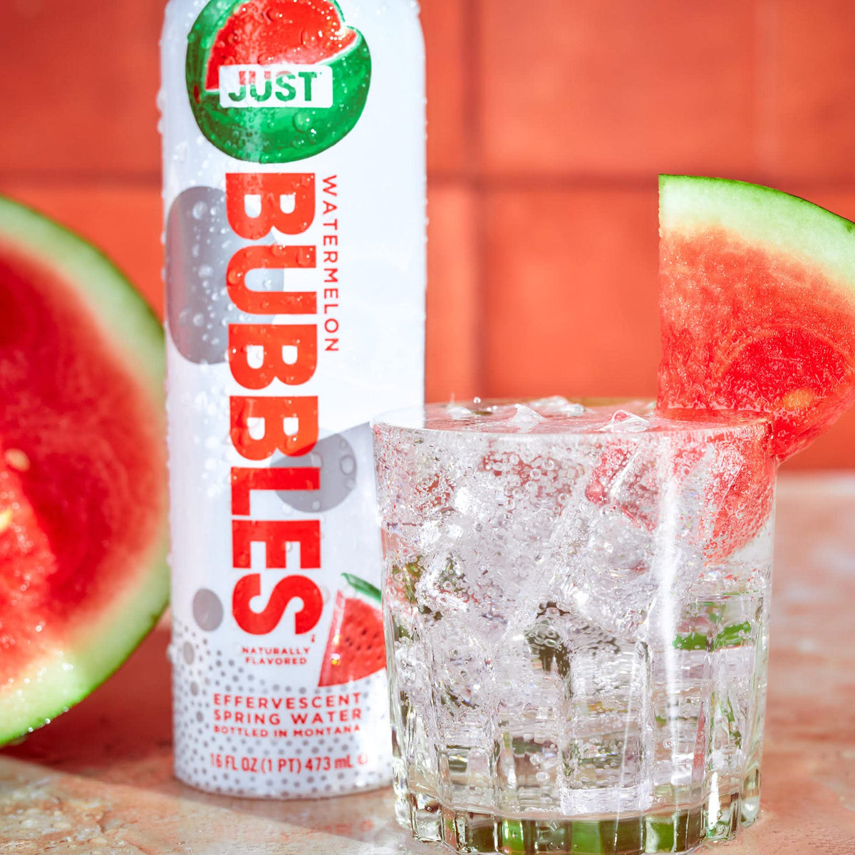 JUST Bubbles Watermelon carbonation-bubbles close-up conveys refreshing sparkle.