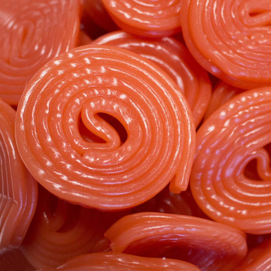 Just Candy Broadway Strawberry Wheels Red close-up shows vibrant color and chewy texture.