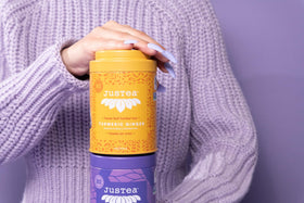 JusTea brewed cup reveals warm amber color and citrus aroma