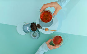 JusTea brewed cup with citrus aroma and floral notes.