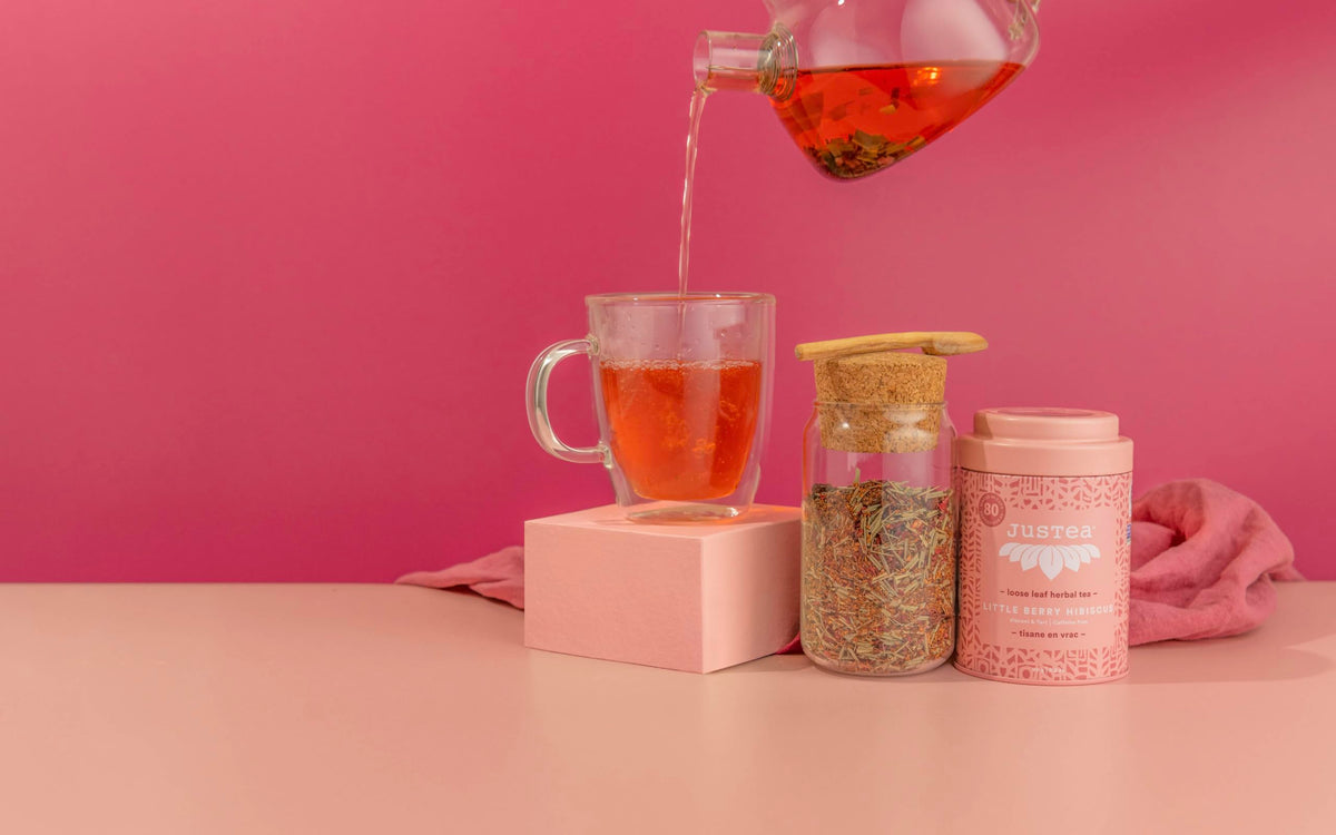 JusTea Little Berry Hibiscus packaging emphasizing Fair Trade and authenticity