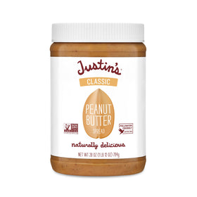 Justin's Classic Peanut Butter jar (28 oz) with creamy spread for easy spreading