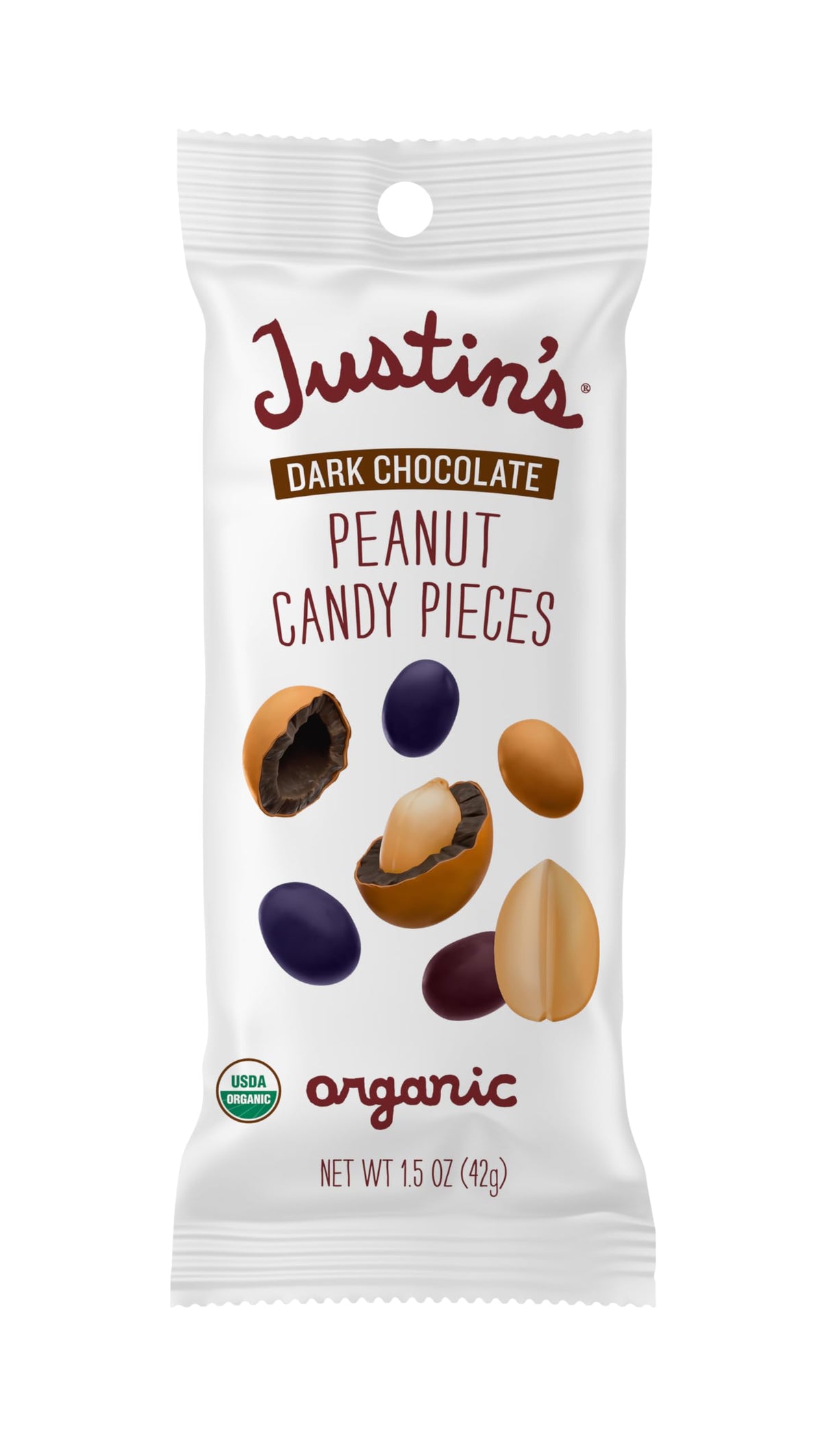 Close-up of Justin's dark chocolate peanut candy pieces with visible peanuts and glossy chocolate